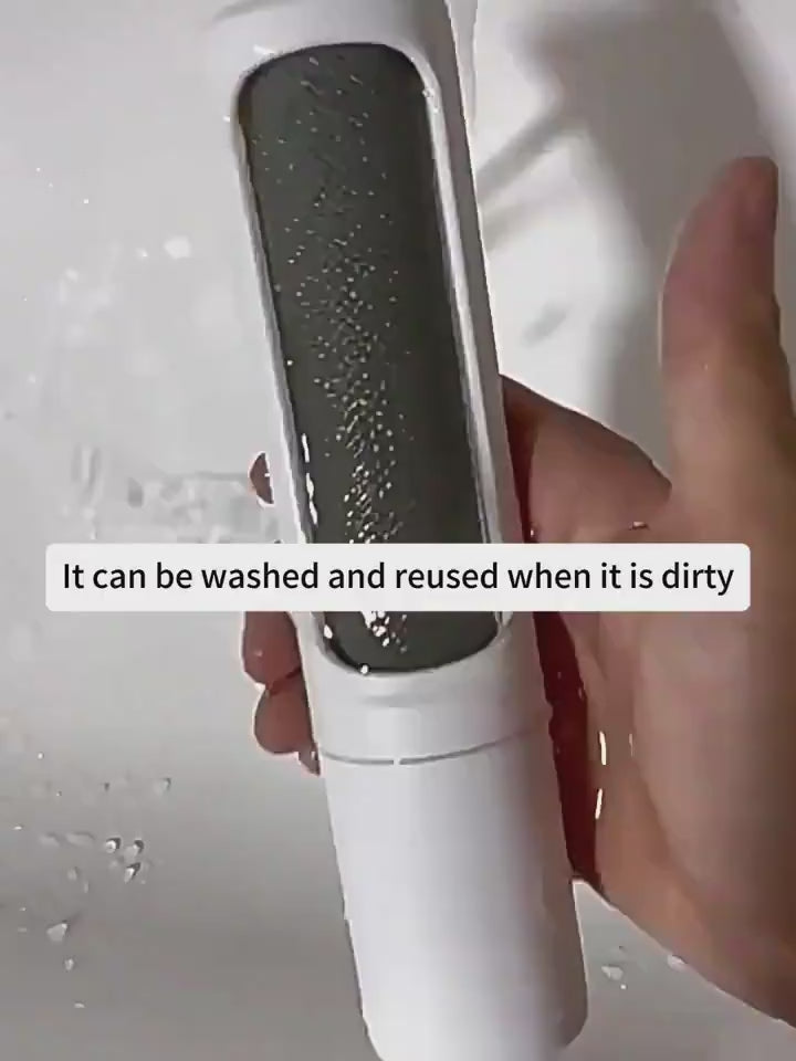 Rinsing the FurLift roller head under running water to clean and reuse it